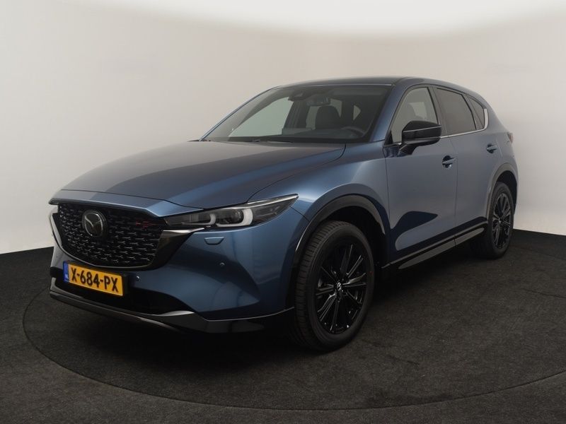Blauw metallic Gebruikt 2024 Mazda CX-5 Homura-Line SUV | € 37.950 (Eerlijke prijs) - Afbeelding 1/4
