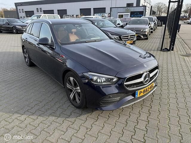 Occasion Mercedes C180 AMG line 170 PK (125 kW) 2022 Blauw Stationwagen