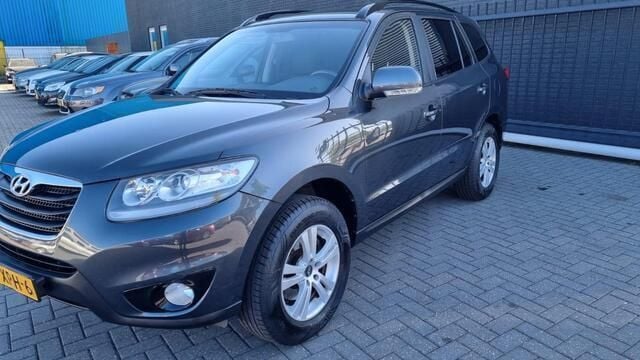 Grijs Gebruikt 2012 Hyundai Santa Fe Dynamiq SUV | € 6.999 (Eerlijke prijs) - Afbeelding 1/4