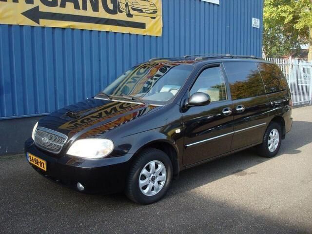 Zwart Gebruikt 2004 Kia Carnival EX MPV | € 2.950 - Afbeelding 1/4