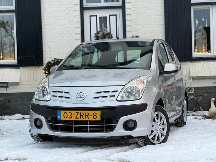 Grijs Occasion 2011 Nissan Pixo Acenta Hatchback | € 3.995 (Eerlijke prijs) - Afbeelding 1/4