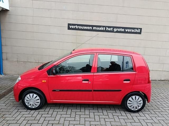 Rood Occasion 2005 Daihatsu Cuore Hatchback | € 1.950 - Afbeelding 1/4