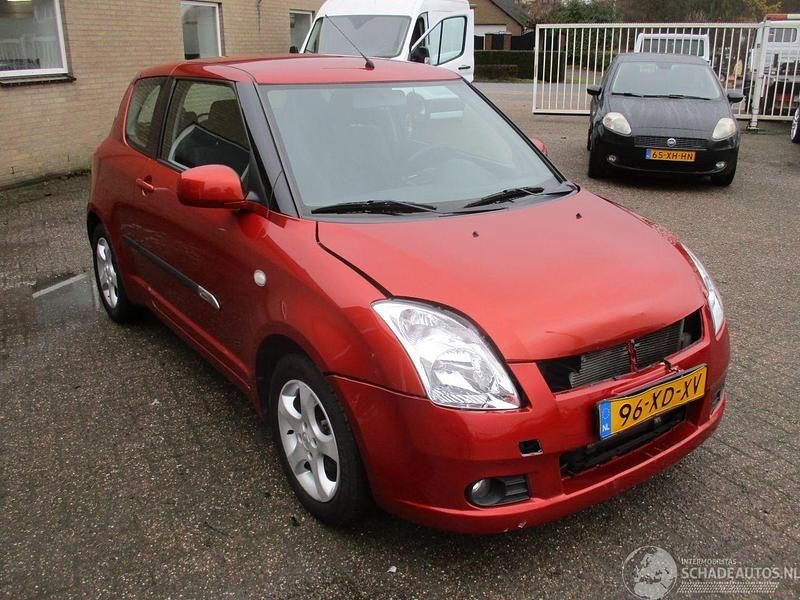 Oranje Gebruikt 2007 Suzuki Swift Exclusive Hatchback | € 2.250 (Goede deal) - Afbeelding 1/4