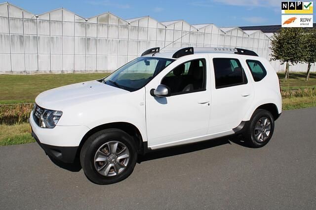 Wit, metallic lak Gebruikt 2015 Dacia Duster Prestige SUV | € 8.950 (Eerlijke prijs) - Afbeelding 1/4