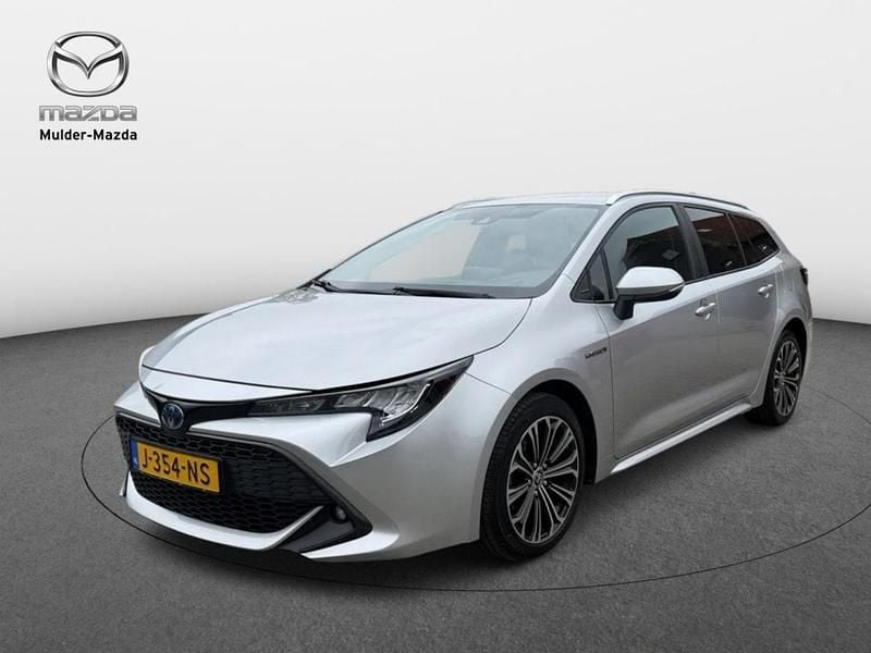 Grijs Gebruikt 2020 Toyota Corolla Stationwagen | € 18.450 (Goede deal) - Afbeelding 1/3