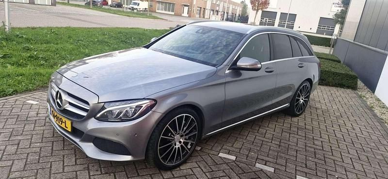 Grijs Occasion 2015 Mercedes C350e Edition Stationwagen | € 13.450 (Eerlijke prijs) - Afbeelding 1/4