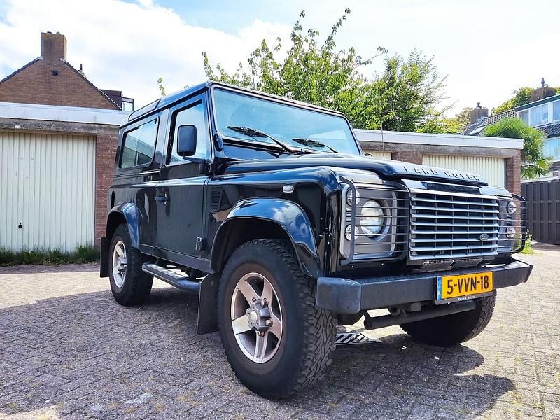 Zwart (metallic) Gebruikt 2012 Land Rover Defender Van | € 40.000 (Goede deal) - Afbeelding 1/4
