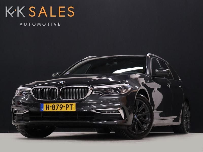 Grijs Occasion 2020 BMW 520 M Sport Stationwagen | € 27.835 (Eerlijke prijs) - Afbeelding 1/4