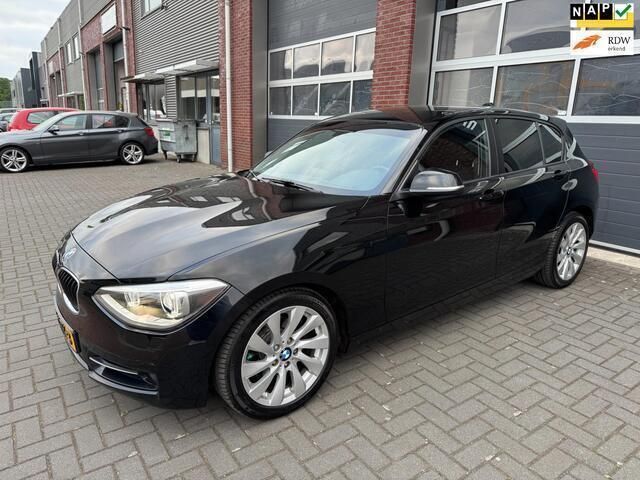 Zwart Gebruikt 2012 BMW 118 Sport Line Hatchback | € 9.450 (Iets duurder) - Afbeelding 1/4