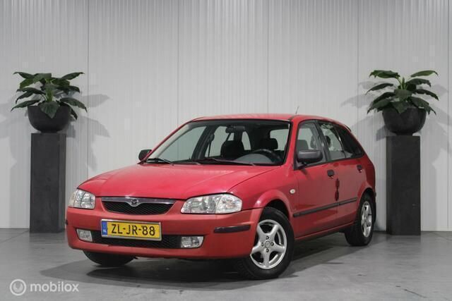 Rood Gebruikt 1999 Mazda 323 Hatchback | € 1.350 (Eerlijke prijs) - Afbeelding 1/4