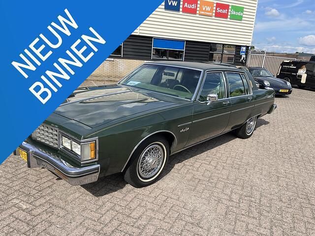 Groen Gebruikt 1980 Oldsmobile Custom Cruiser Stationwagen | € 22.500 - Afbeelding 1/4