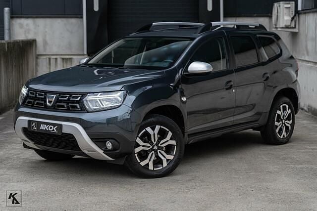 Grijs Gebruikt 2022 Dacia Duster Prestige SUV | € 22.499 (Eerlijke prijs) - Afbeelding 1/4