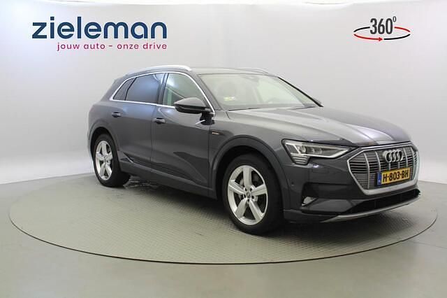 Grijs Gebruikt 2019 Audi e-tron Comfort SUV | € 19.845 (Goede deal) - Afbeelding 1/4
