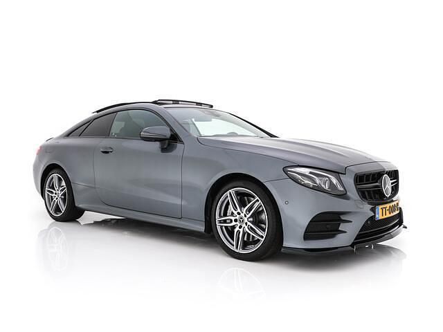Grijs (metallic) Gebruikt 2017 Mercedes E400 Premium Plus Coupé | € 41.945 (Goede deal) - Afbeelding 1/4