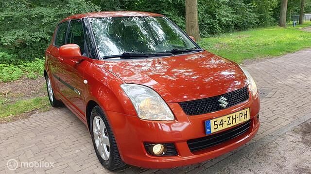Oranje Gebruikt 2008 Suzuki Swift Hatchback | € 1.795 (Goede deal) - Afbeelding 1/4