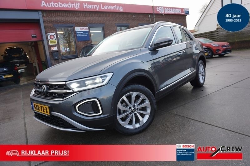Grijs Gebruikt 2024 VW T-Roc Style SUV | € 34.950 (Eerlijke prijs) - Afbeelding 1/4