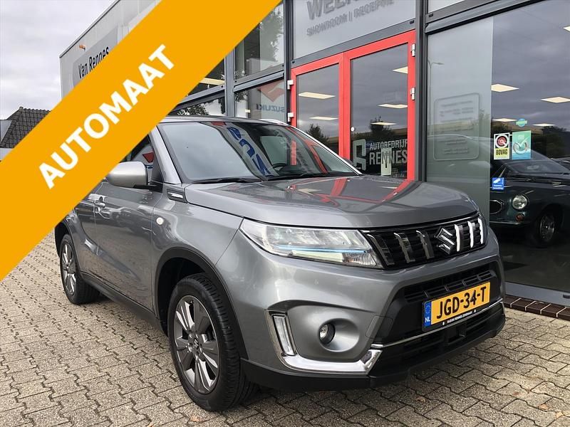 Grijs Gebruikt 2021 Suzuki Vitara SUV | € 23.950 (Eerlijke prijs) - Afbeelding 1/4