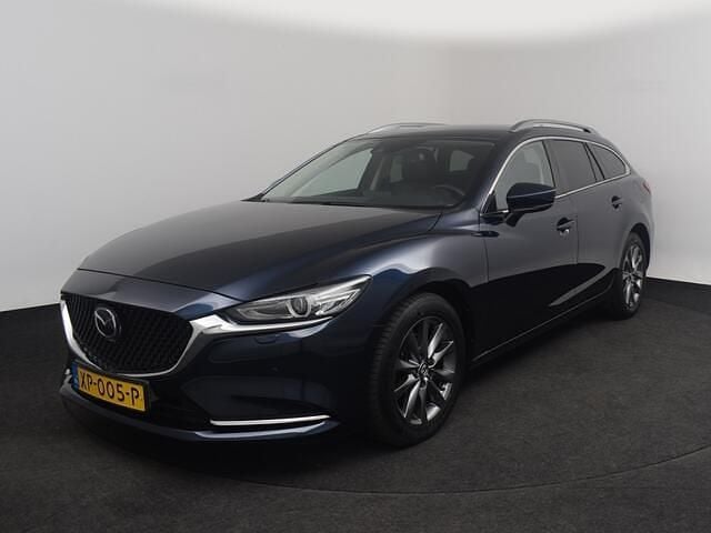 Deep crystal blue (blauw metallic) Gebruikt 2019 Mazda 6 Comfort Stationwagen | € 24.850 (Eerlijke prijs) - Afbeelding 1/4