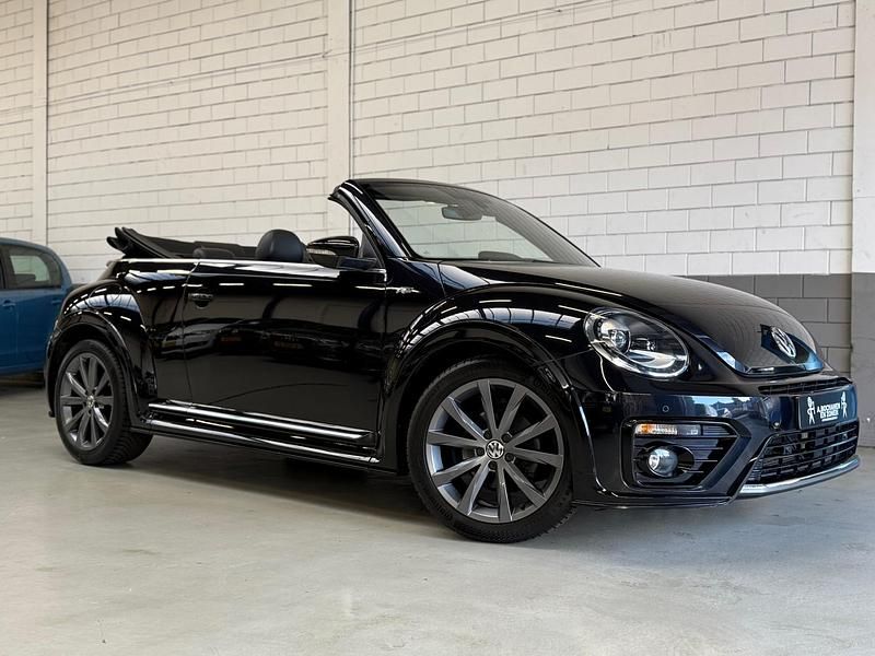 Zwart Occasion 2025 VW Beetle R-line BlueMotion Cabriolet | € 22.950 - Afbeelding 1/4