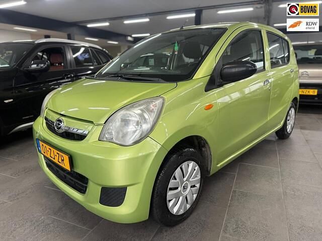 Occasion Daihatsu Cuore 69 PK (50 kW) 2008 Groen (metallic) Hatchback