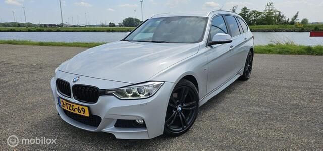 Grijs Gebruikt 2014 BMW 316 M Sport Stationwagen | € 9.950 (Eerlijke prijs) - Afbeelding 1/4