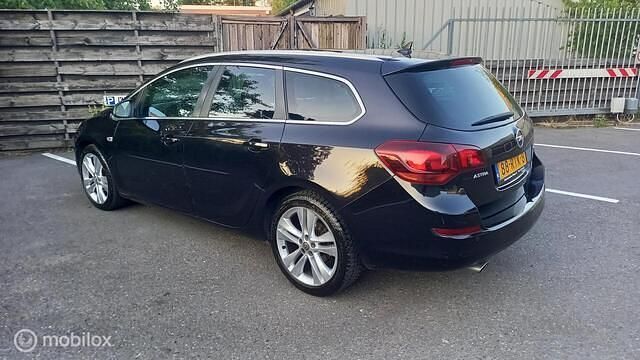 Occasion Opel Astra 140 PK (102 kW) 2011 Zwart Stationwagen