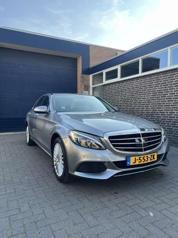 Grijs Gebruikt 2014 Mercedes C180 Prestige Sedan | € 15.999 (Eerlijke prijs) - Afbeelding 1/4