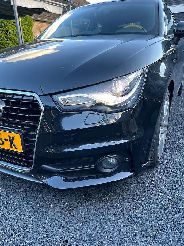 Zwart Gebruikt 2012 Audi A1 Proline Hatchback | € 12.950 (Eerlijke prijs) - Afbeelding 1/4
