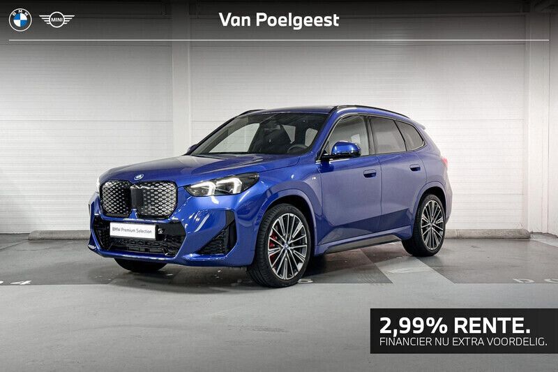 Blauw Gebruikt 2024 BMW iX1 M Sport SUV | € 47.900 (Eerlijke prijs) - Afbeelding 1/4
