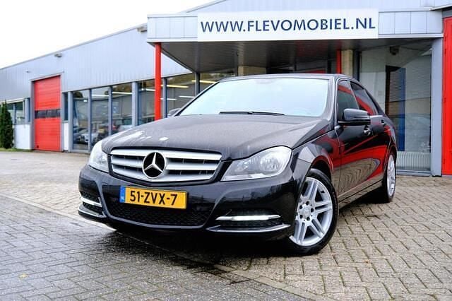 Zwart Gebruikt 2013 Mercedes C180 Avantgarde Sedan | € 11.450 (Eerlijke prijs) - Afbeelding 1/4
