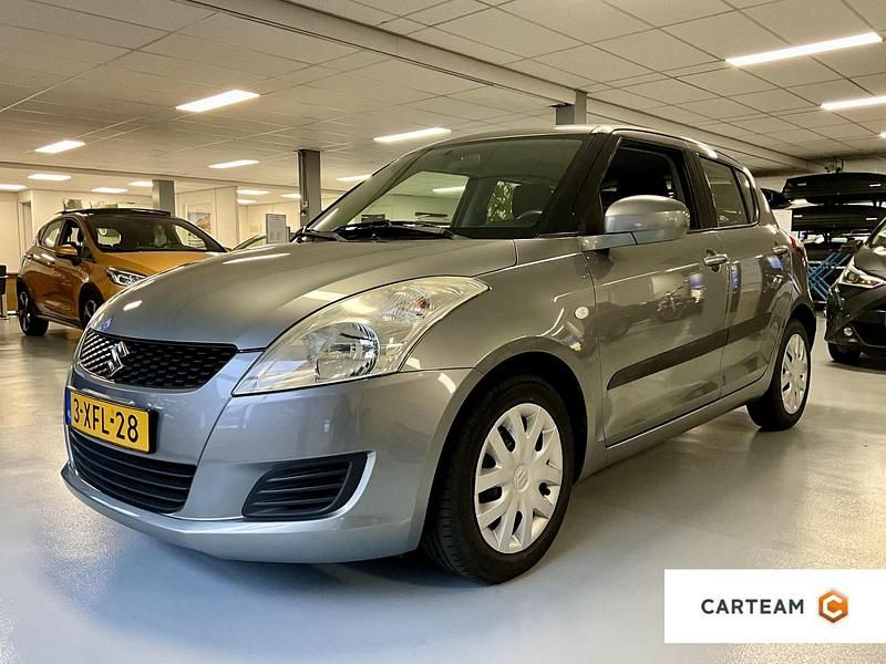Grijs Gebruikt 2014 Suzuki Swift Comfort Hatchback | € 7.950 (Eerlijke prijs) - Afbeelding 1/4