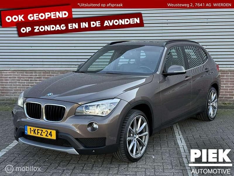 Bruin, metallic lak Gebruikt 2013 BMW X1 Executive SUV | € 11.999 (Goede deal) - Afbeelding 1/3