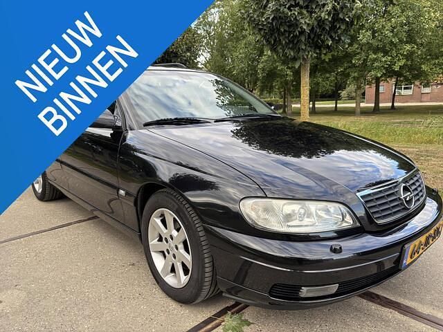 Zwart Occasion 2002 Opel Omega Business Edition Stationwagen | € 1.995 - Afbeelding 1/4