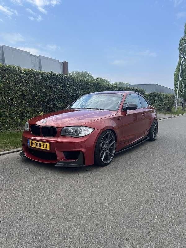 Rood Gebruikt 2011 BMW 135 Coupé Exclusive Coupé | € 22.500 - Afbeelding 1/4