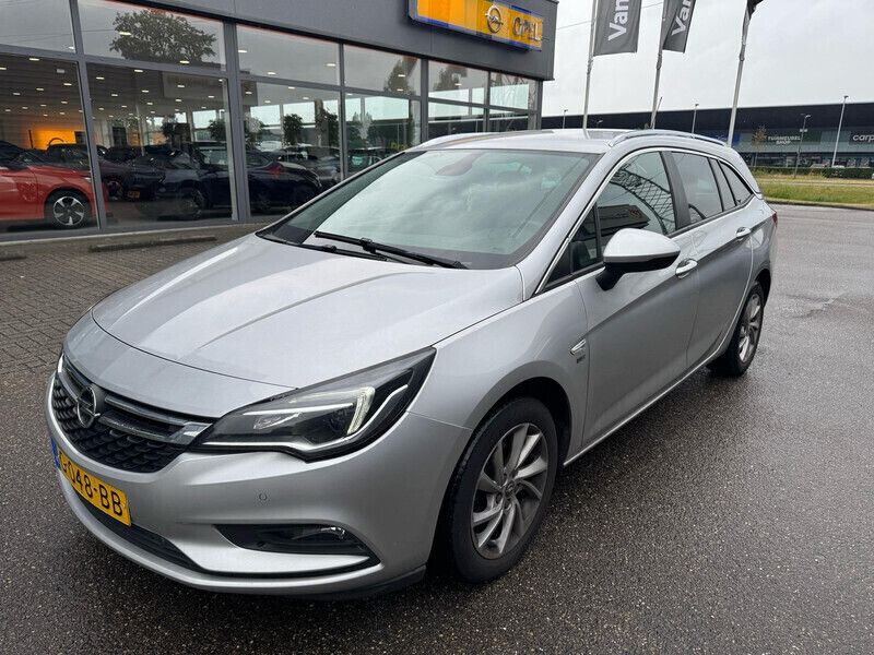 Grijs Gebruikt 2019 Opel Astra Edition Stationwagen | € 13.640 (Eerlijke prijs) - Afbeelding 1/3