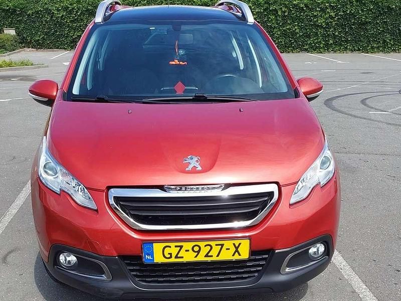 Oranje Gebruikt 2015 Peugeot 2008 Active SUV | € 6.500 (Goede deal) - Afbeelding 1/4
