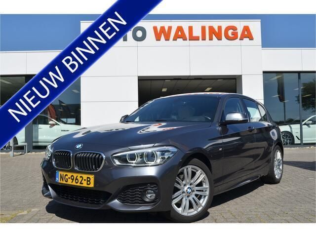 Grijs, metallic lak Gebruikt 2017 BMW 118 Executive Hatchback | € 13.900 (Eerlijke prijs) - Afbeelding 1/4
