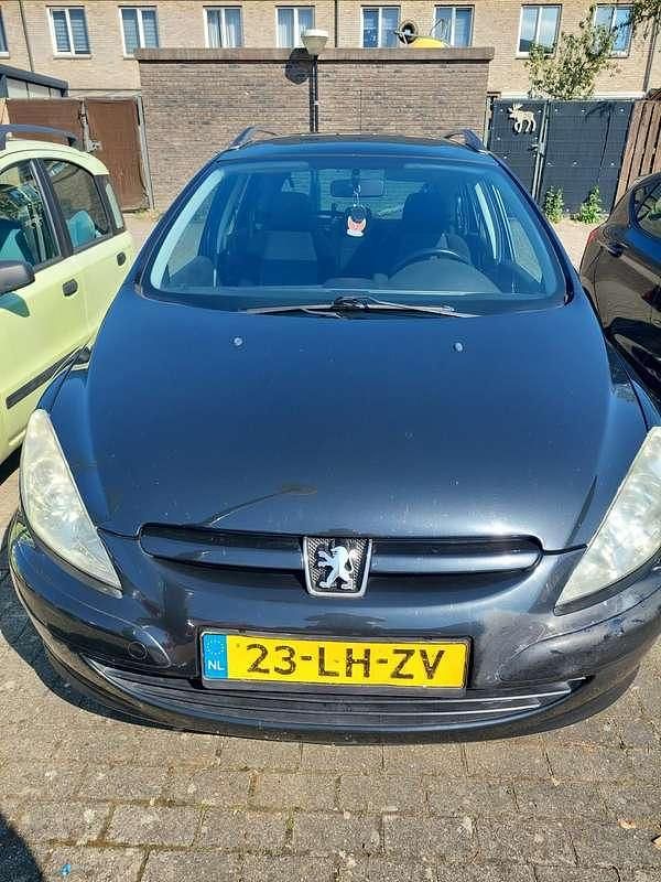 Zwart Gebruikt 2003 Peugeot 307 Stationwagen | € 1.000 (Eerlijke prijs) - Afbeelding 1/4