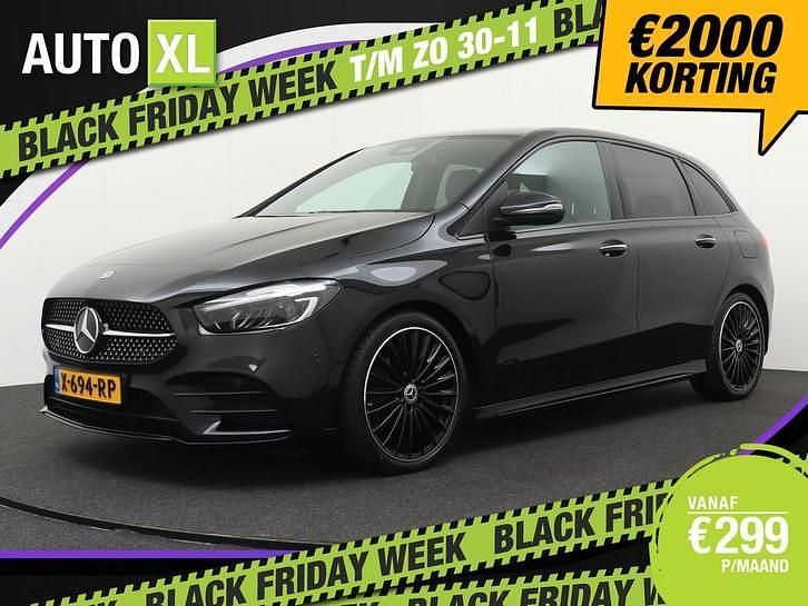 Zwart (metallic) Gebruikt 2023 Mercedes B180 AMG line MPV | € 34.940 (Eerlijke prijs) - Afbeelding 1/4