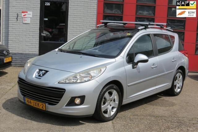 Grijs, metallic lak Gebruikt 2009 Peugeot 207 Stationwagen | € 2.250 (Eerlijke prijs) - Afbeelding 1/4