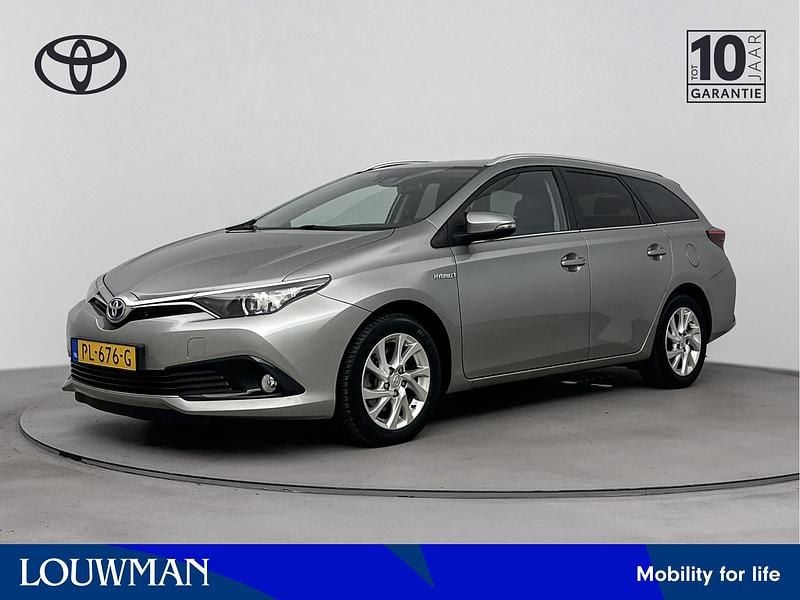 Grijs Gebruikt 2017 Toyota Auris Hybrid Stationwagen | € 14.600 (Goede deal) - Afbeelding 1/3