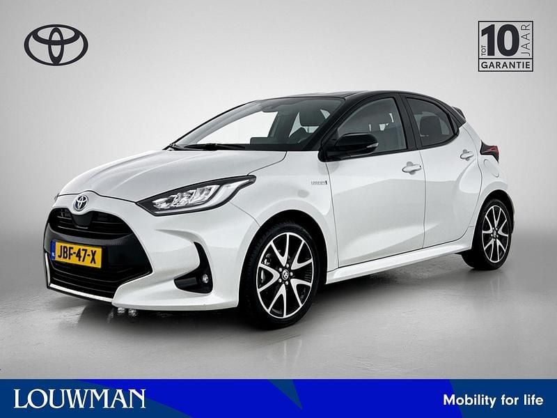 Wit Gebruikt 2021 Toyota Yaris Hybrid Executive Hatchback | € 21.950 (Eerlijke prijs) - Afbeelding 1/3