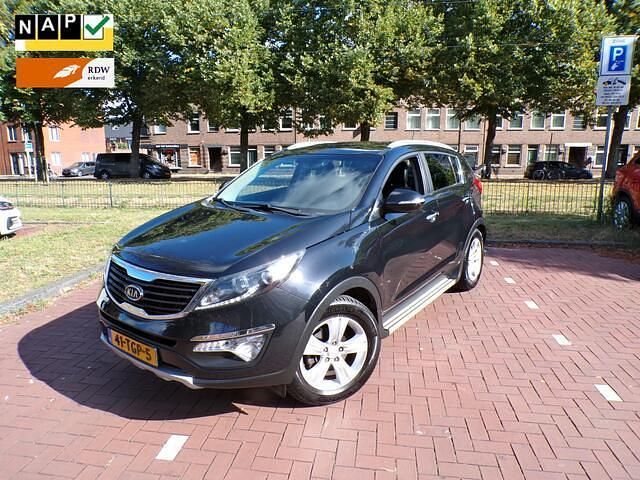 Zwart, metallic lak Occasion 2012 Kia Sportage Plus SUV | € 9.644 (Goede deal) - Afbeelding 1/4