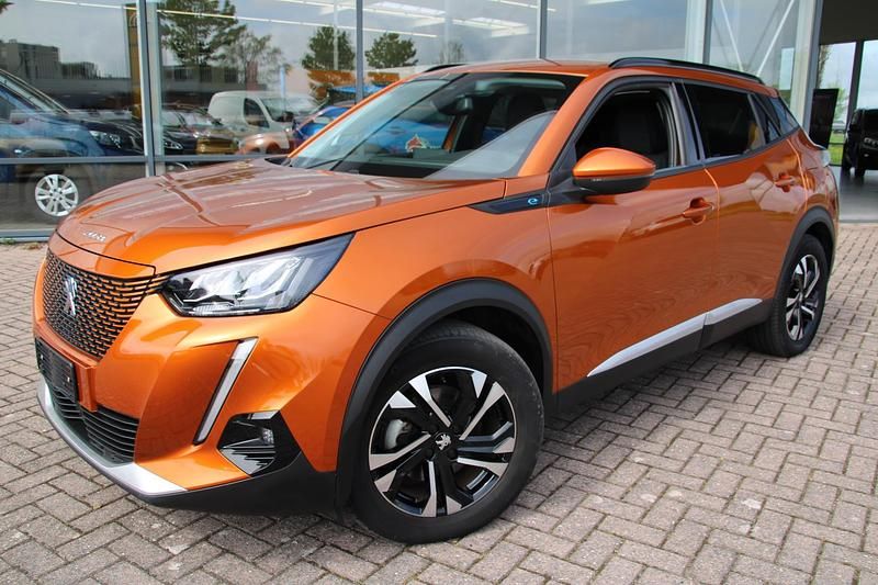 Oranje Gebruikt 2021 Peugeot e-2008 Allure SUV | € 20.550 (Iets duurder) - Afbeelding 1/4