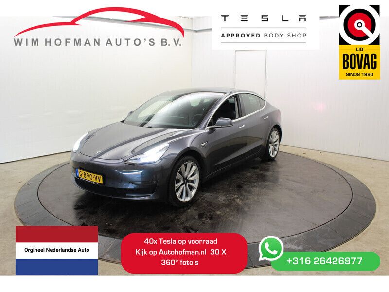 Grijs, metallic lak Gebruikt 2019 Tesla Model 3 Long Range Sedan | € 19.940 (Eerlijke prijs) - Afbeelding 1/4