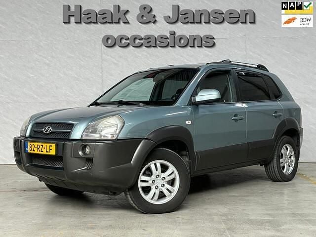 Grijs Gebruikt 2005 Hyundai Tucson Dynamiq SUV | € 2.495 (Eerlijke prijs) - Afbeelding 1/4