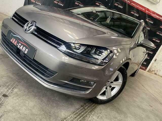 Grijs Gebruikt 2014 VW Golf VII Highline Stationwagen | € 10.999 (Eerlijke prijs) - Afbeelding 1/4