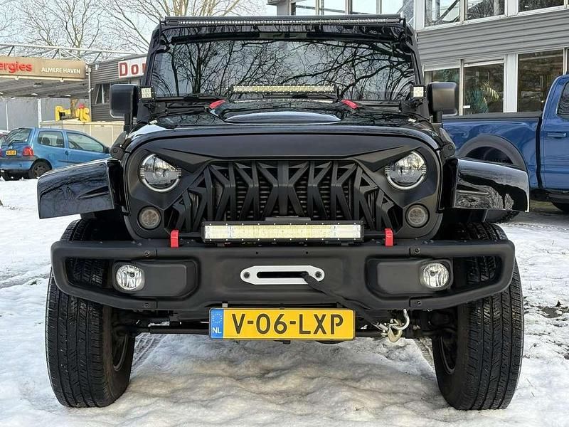 Zwart (metallic) Gebruikt 2018 Jeep Wrangler Sport SUV | € 34.950 (Eerlijke prijs) - Afbeelding 1/4