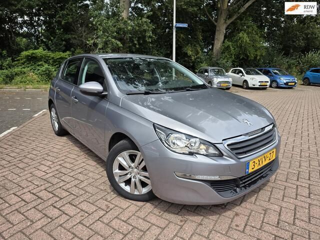 Grijs, metallic lak Gebruikt 2014 Peugeot 308 Hatchback | € 5.950 (Eerlijke prijs) - Afbeelding 1/4