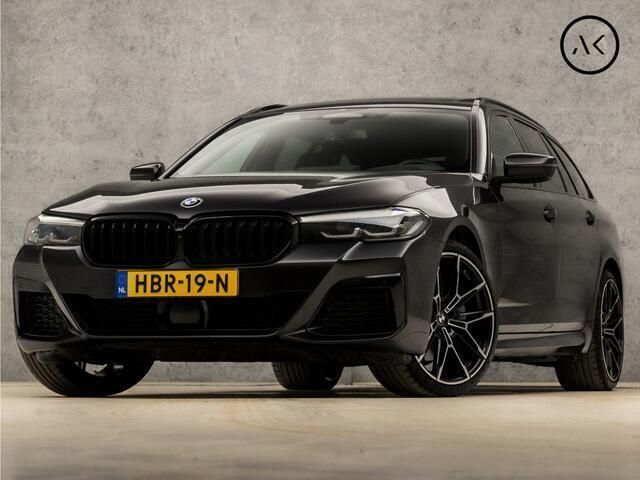 Grijs, metallic lak Gebruikt 2023 BMW 530 M Sport Stationwagen | € 53.945 (Eerlijke prijs) - Afbeelding 1/4